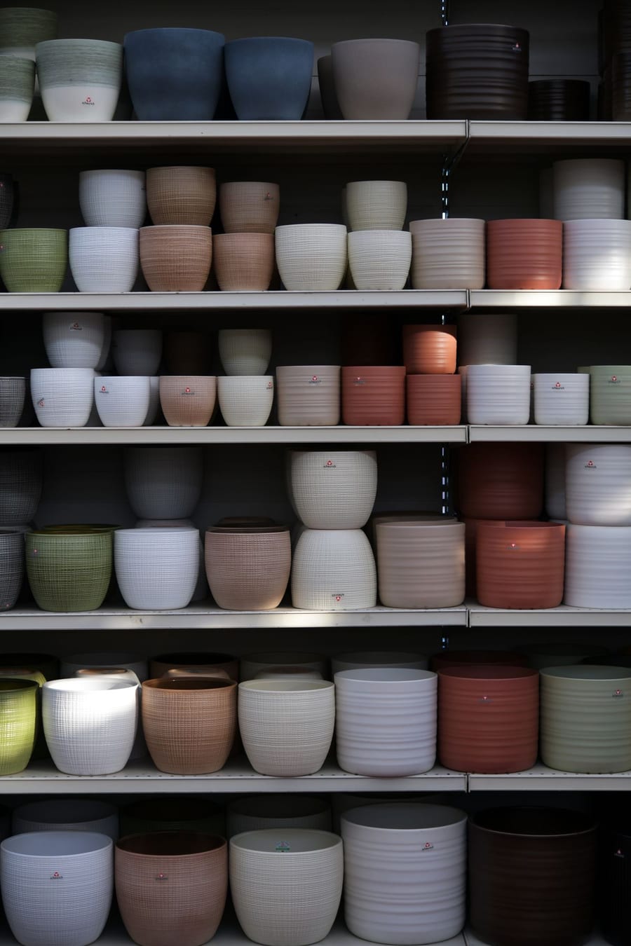 A display of ceramic plant pots in different sizes